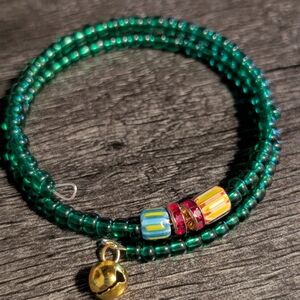 Handcrafted green memory wire charm bracelet